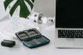 Still life working from home desk with professional photographic equipment, camera, lens, computer monitor, electronics indoors Royalty Free Stock Photo