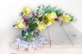 Bouquet with yellow irises in a glass vase on a white background. Royalty Free Stock Photo