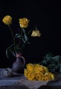 Still life with yellow withered flowers