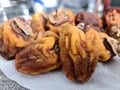 Still life of yummy appetizing dried orange perssimons