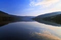 Still and peaceful evening light reflected in Tallybont