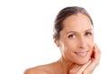 Still radiantly beautiful. Studio portrait of a beautiful mature woman posing against a white background.