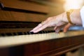 She still remembers the melody. an unidentifiable senior woman playing the piano at home. Royalty Free Stock Photo