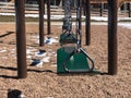 Empty swings on a playground Royalty Free Stock Photo