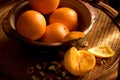 Stillife with oranges on rattan tray Royalty Free Stock Photo