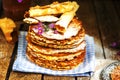 Stillife of Pile rustic homemade wafers on waffle-iron