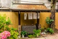 Stillness at the water basin at the entrance of a shrine in Japan for the riual Temizuya purification - 1