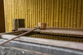 Stillness at the water basin at the entrance of a shrine in Japan for the riual Temizuya purification - 2