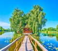 The stilt bridge to the Fisherman`s House, Old Solotvyn, Ukraine