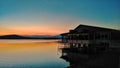 Stilt house on the lake at sunset Royalty Free Stock Photo