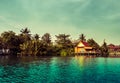 Stilt houses above river in rural Thailand. Royalty Free Stock Photo