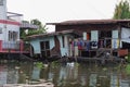 Stilt houses at a klong in Bangkok. Klongs are the canals, that branch off from Chao Phraya river, the big river of Bangkok. The