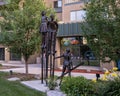 `Stilt Walkers` by Dennis Smith in Possibility Plaza of Main Street Mall in Avon, Colorado. Royalty Free Stock Photo