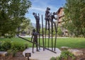 `Stilt Walkers` by Dennis Smith in Possibility Plaza of Main Street Mall in Avon, Colorado. Royalty Free Stock Photo