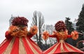 Stilt-walkers in funny colorful costumes pose for a photography during Shrovetide celebrations in Kyiv