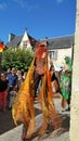 Stilt walkers at medieval carnival in France