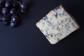 Stilton Blue Cheese with Sable Grapes Royalty Free Stock Photo
