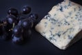 Stilton Blue Cheese with Sable Grapes Royalty Free Stock Photo