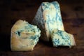 Stilton mature blue mouldy cheese - Dark background