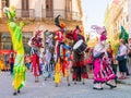 Stiltwalkers dancing to the sound of cuban music in Havana Royalty Free Stock Photo