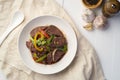 Stir fred Pork Liver in garlicky sweet savory sauce with crunchy bell peppers