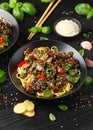 Stir fried beef in black bean sauce with vegetables and noodles. Take away food Royalty Free Stock Photo