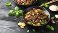 Stir fried beef in black bean sauce with vegetables and noodles. Take away food Royalty Free Stock Photo