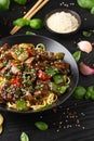 Stir fried beef in black bean sauce with vegetables and noodles. Take away food Royalty Free Stock Photo