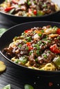 Stir fried beef in black bean sauce with vegetables and noodles. Take away food Royalty Free Stock Photo