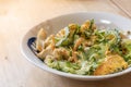 Stir-fried bitter melon and egg, the traditional food of Okinawa, Japan, contained in a white dish