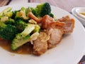 Stir fried broccoli with crispy pork Royalty Free Stock Photo