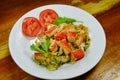 Stir fried cabbage with crab stick and egg on dish Royalty Free Stock Photo