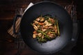 Stir fried chicken in cast iron wok Royalty Free Stock Photo