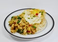 Stir fried chicken with chili basil and fried egg Royalty Free Stock Photo
