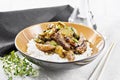 Stir-fried of chicken with zucchini in plate on granite Royalty Free Stock Photo