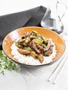 Stir-fried of chicken with zucchini in plate on stone countertop Royalty Free Stock Photo