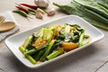 Stir fried Chinese broccoli with sun-dried salted fish Royalty Free Stock Photo