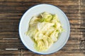 Stir fried chinese cabbage with oyster sauce in white tin dish Royalty Free Stock Photo