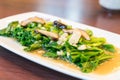 stir-fried chinese kale with shiitake mushroom Royalty Free Stock Photo