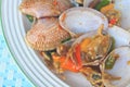 Stir fried clams with roasted chili paste and thai sweet basil Royalty Free Stock Photo