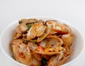 Stir fried clams with roasted chili on white background, Thai Food, Top view.