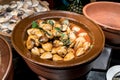 Stir fried clams with Thai sweet roasted chili paste and basil i Royalty Free Stock Photo