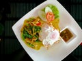 Stir fried cowpea with spicy chicken topped on rice Royalty Free Stock Photo