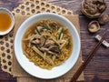 Stir fried egg noodle topped with chicken gravy - Gai see mee or Thai food called Geoy see mee Royalty Free Stock Photo