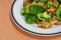 Stir fried flat noodle and pork with preserved soy bean paste Royalty Free Stock Photo