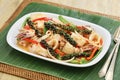 Stir fried fresh squid with kampot pepper