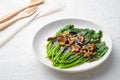 Stir fried kale Chinese Broccoli in oyster sauce with Shitake Mushrooms and fried garlic