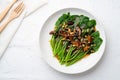 Stir fried kale Chinese Broccoli in oyster sauce with Shitake Mushrooms and fried garlic.Top view Royalty Free Stock Photo