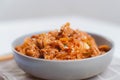 Stir fried kimchi and kurobuta pork on cooked rice in a bowl and serve. Korean food. Korean homemade food for lunch Royalty Free Stock Photo