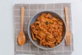 Stir fried kimchi and kurobuta pork on cooked rice in a bowl and serve. Korean food. Korean homemade food for lunch Royalty Free Stock Photo